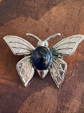 Silver-Tone Butterfly Brooch with Dark Blue Glass Cabochon